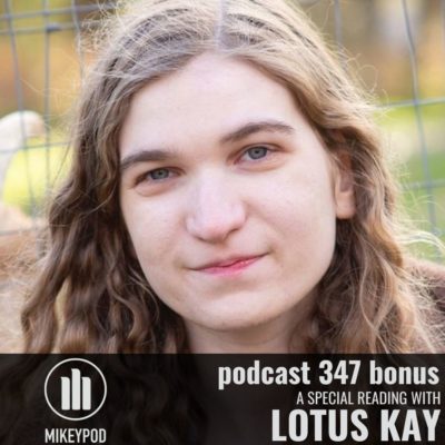 Portrait of Lotus Kay sitting outdoors.