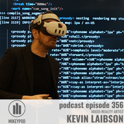 A man wearing a cream-colored VR headset stands in front of a computer monitor displaying blue code. MikeyPod logo and text overlay for podcast episode 356.
